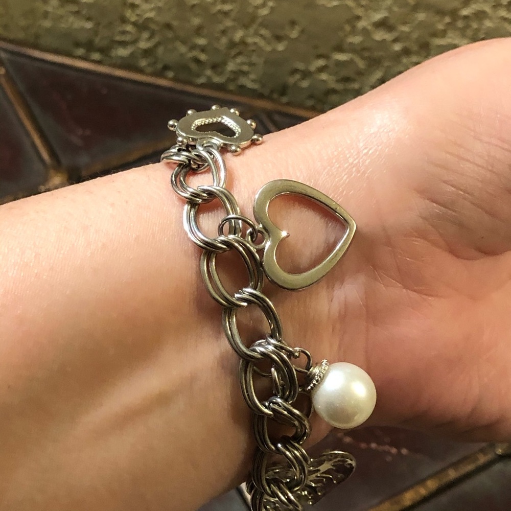 Silver toned charm bracelet